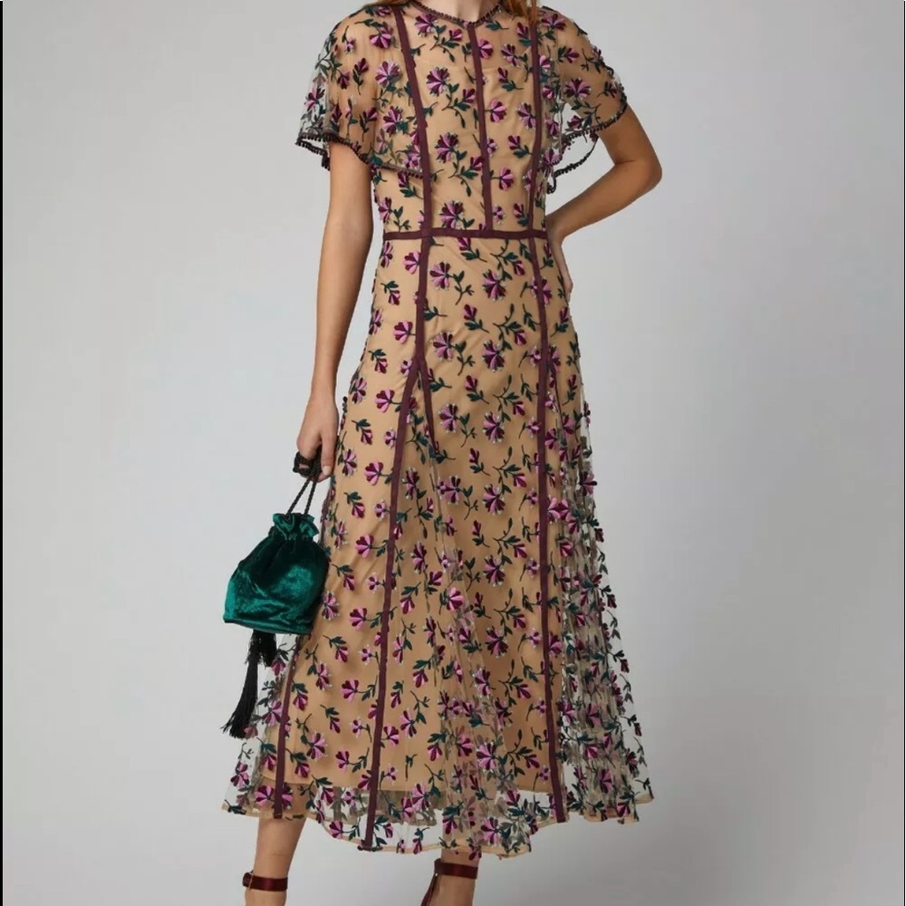 Absolutely beautiful lace floral dress. New with tags. Size 14.